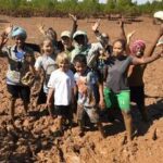 People Planting New Trees
